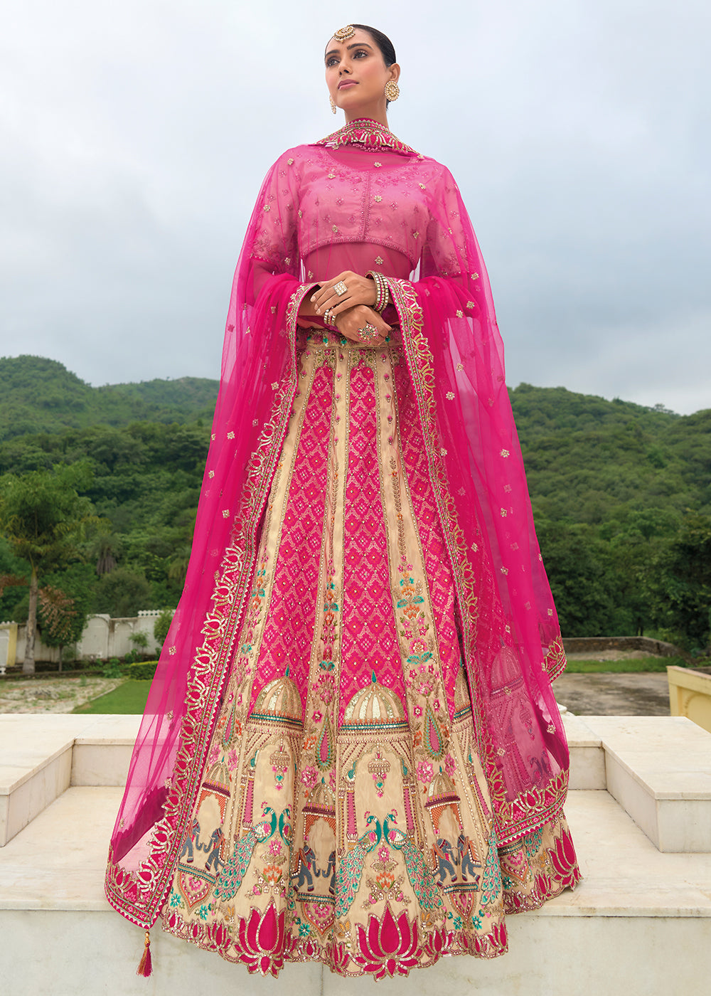 Buy Now Bridal Cream Pink Heavy Embroidered Designer Lehenga Choli Online in USA, UK, Canada, France & Worldwide at Empress Clothing. 