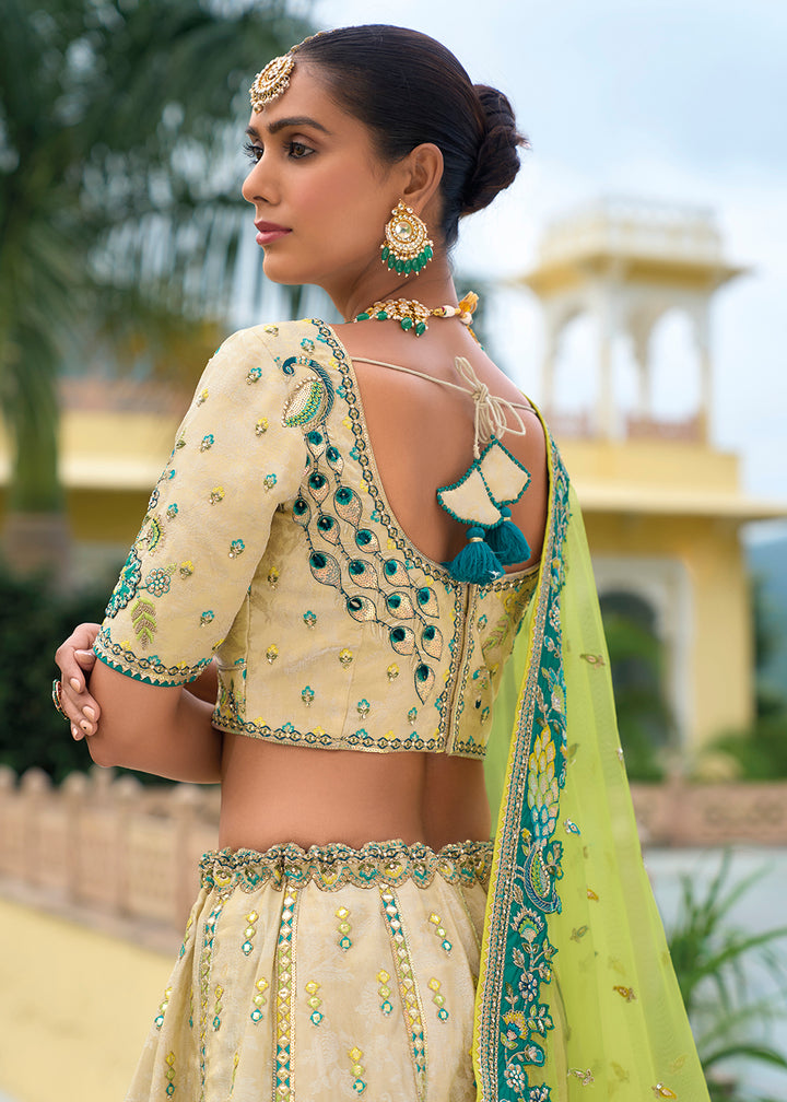 Buy Now Bridal Beige Green Heavy Embroidered Designer Lehenga Choli Online in USA, UK, Canada, France & Worldwide at Empress Clothing.