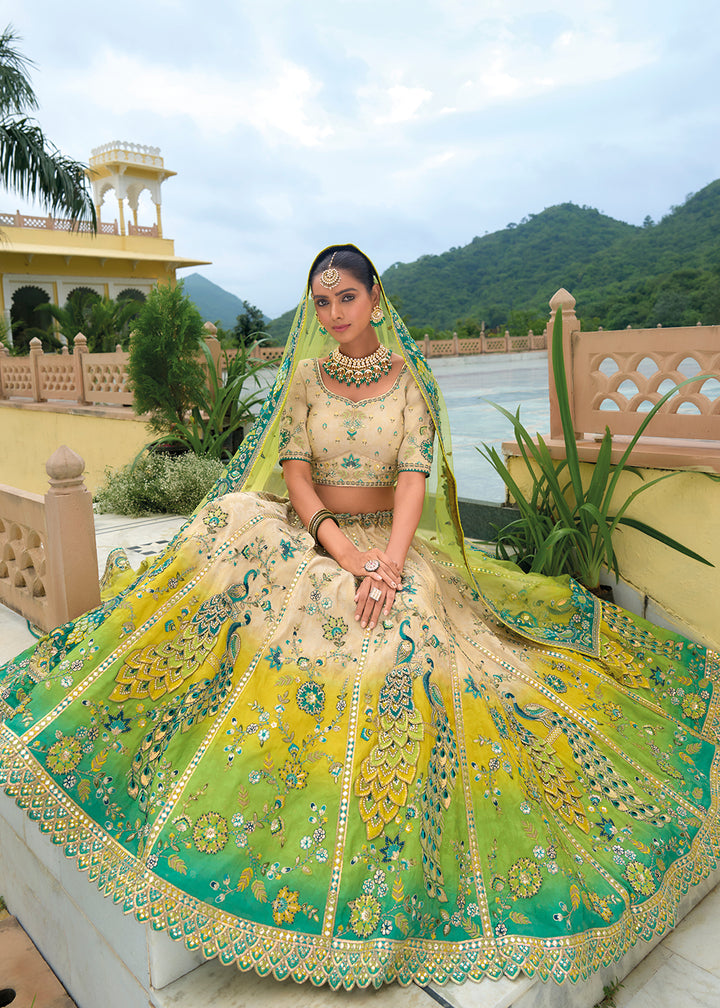 Buy Now Bridal Beige Green Heavy Embroidered Designer Lehenga Choli Online in USA, UK, Canada, France & Worldwide at Empress Clothing.