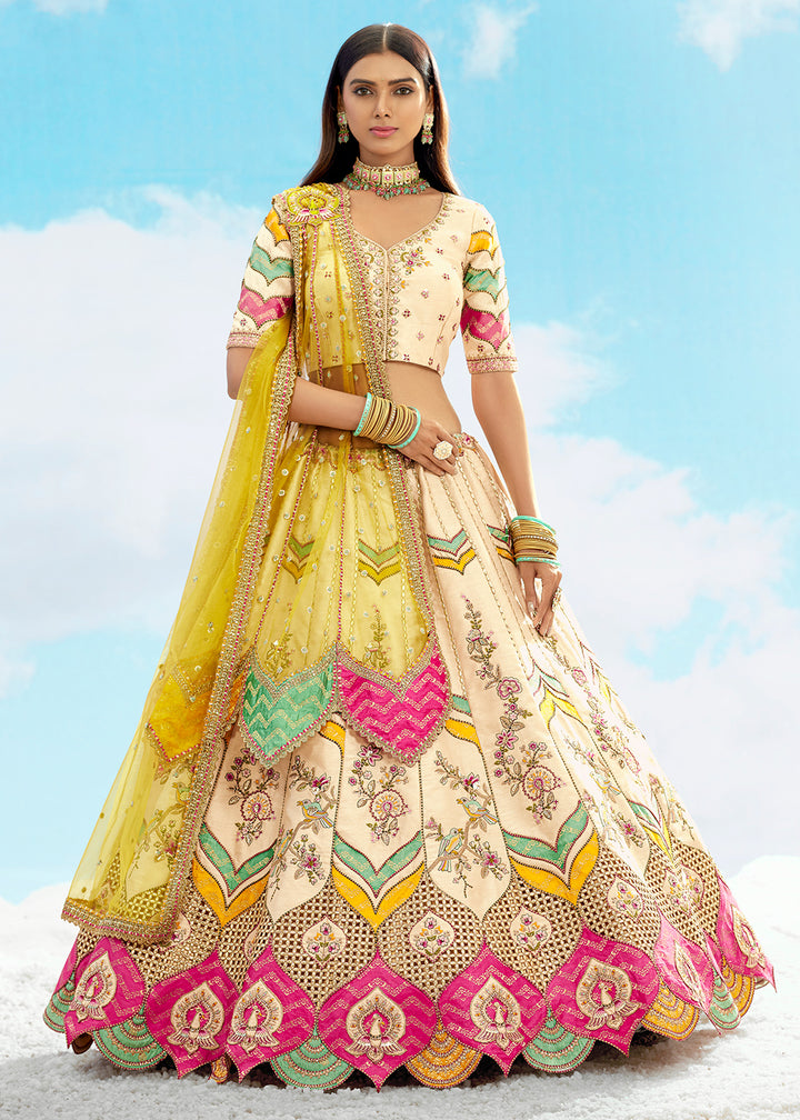 Buy Now Cream Fancy Silk Heavy Embroidered Bridal Lehenga Choli Online in USA, UK, Canada, France, Italy, Germany, Austria, UAE & Worldwide at Empress.