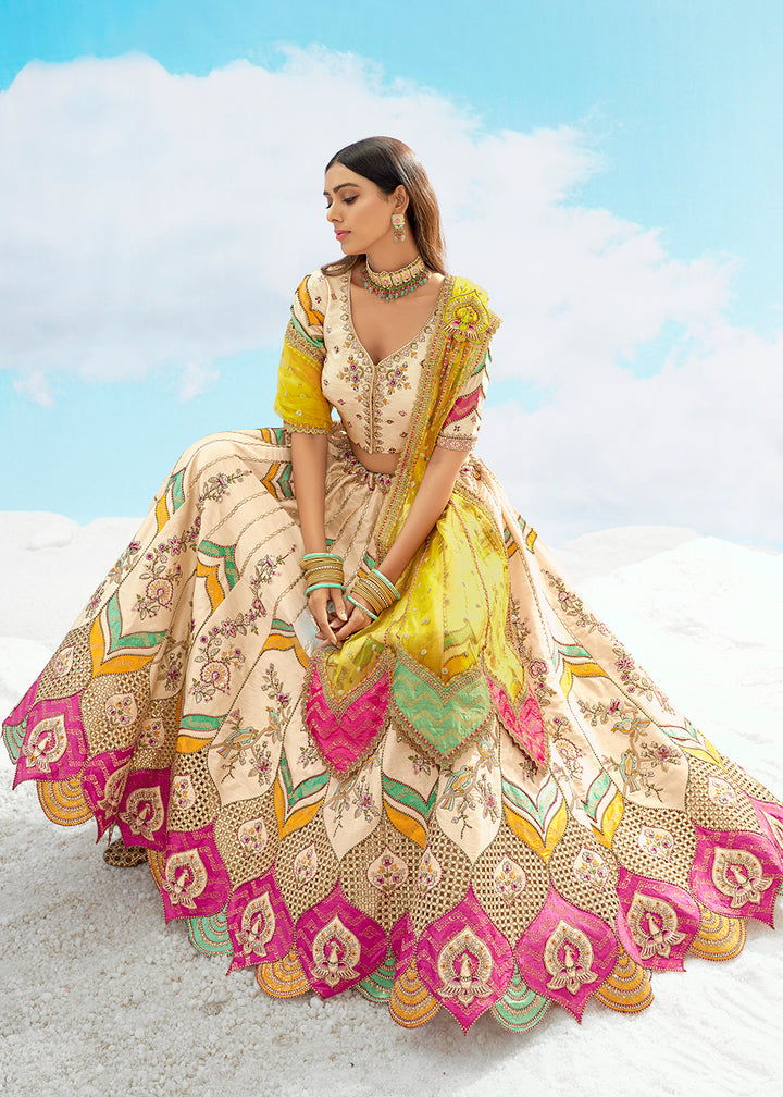 Buy Now Cream Fancy Silk Heavy Embroidered Bridal Lehenga Choli Online in USA, UK, Canada, France, Italy, Germany, Austria, UAE & Worldwide at Empress.
