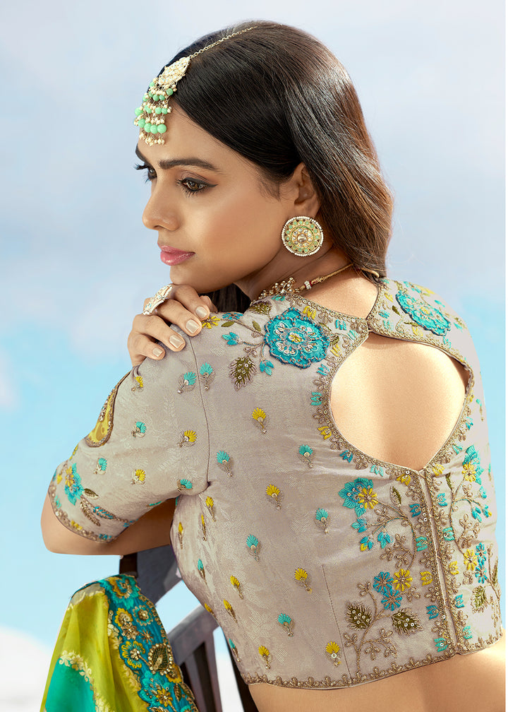 Buy Now Ash Grey Fancy Silk Heavy Embroidered Bridal Lehenga Choli Online in USA, UK, Canada, France, Italy, Germany, Austria, UAE & Worldwide at Empress.