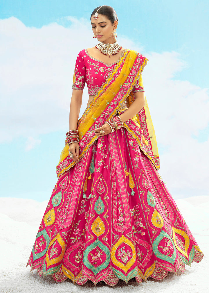 Buy Now Rani Pink Fancy Silk Heavy Embroidered Bridal Lehenga Choli Online in USA, UK, Canada, France, Italy, Germany, Austria, UAE & Worldwide at Empress.