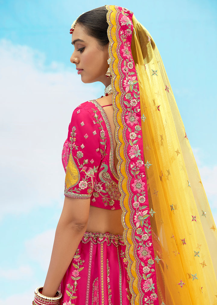Buy Now Rani Pink Fancy Silk Heavy Embroidered Bridal Lehenga Choli Online in USA, UK, Canada, France, Italy, Germany, Austria, UAE & Worldwide at Empress.