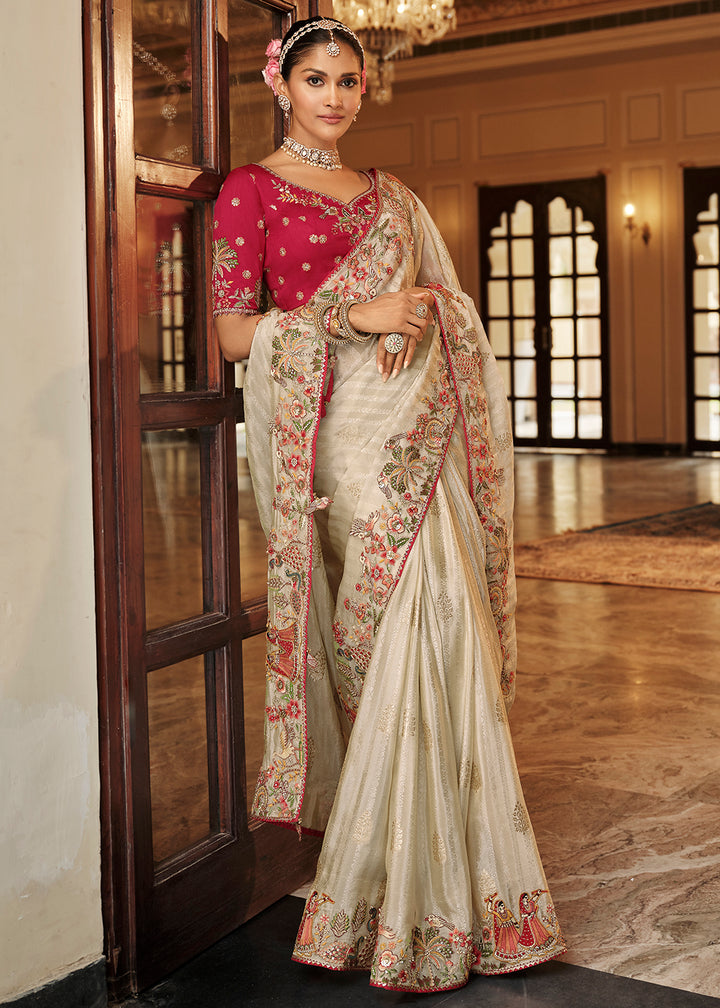Buy Now Creamy Off White Traditional Embroidered Designer Saree Online in US, UK, Canada, France, Germany, Denmark, Netherlands, Sweden & Worldwide at Empress.