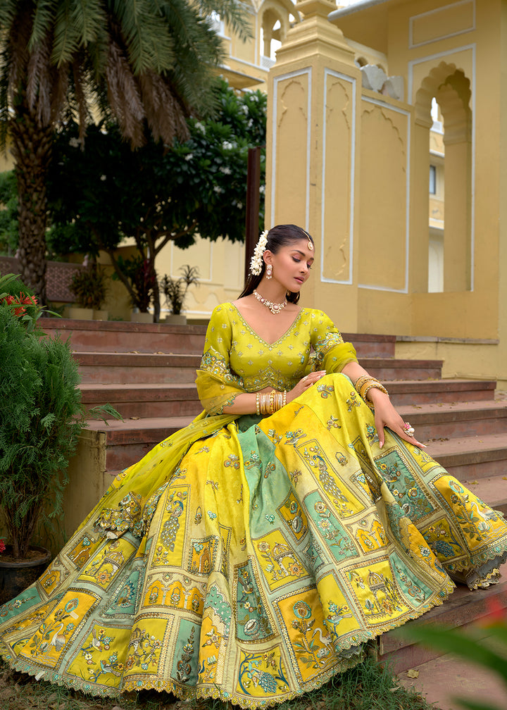 Buy Now Exclusive Green & Yellow Silk Bridal Designer Lehenga Choli Online in US, UK, Canada, France, Italy, Germany, Australia, Greece & Worldwide at Empress.