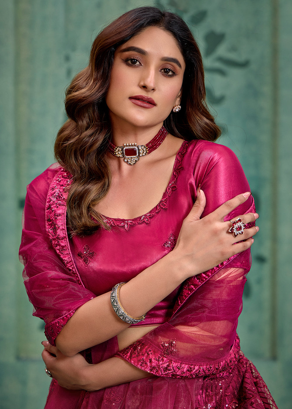 Buy Now Magenta Pink Sequins Embroidred Net Lehenga Choli Online in USA, UK, Canada, Italy, France & Worldwide at Empress Clothing.