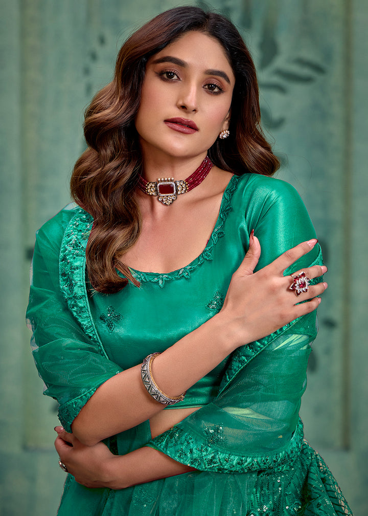 Buy Now Persian Green Sequins Embroidred Net Lehenga Choli Online in USA, UK, Canada, Italy, France & Worldwide at Empress Clothing.