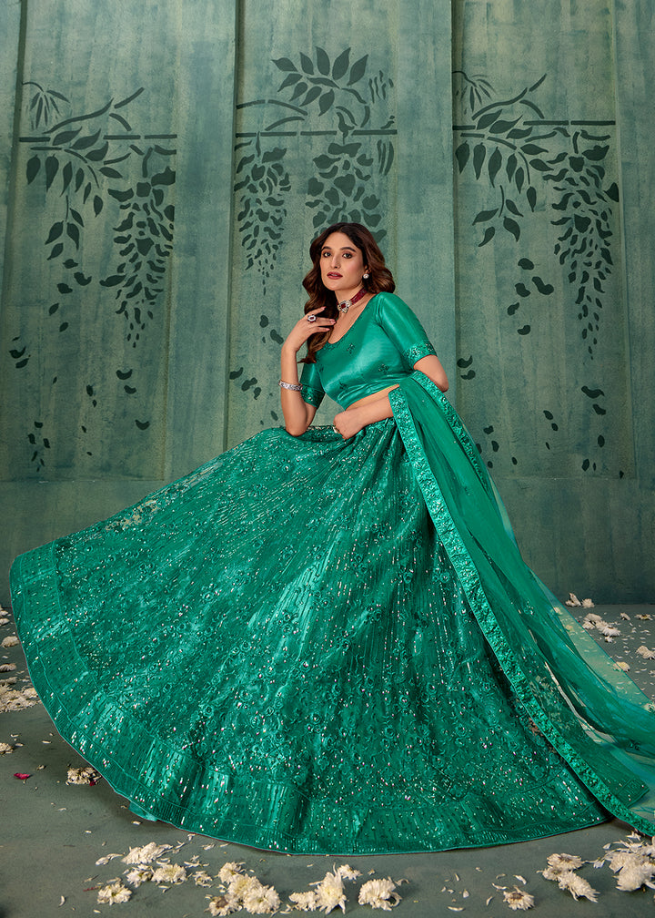 Buy Now Persian Green Sequins Embroidred Net Lehenga Choli Online in USA, UK, Canada, Italy, France & Worldwide at Empress Clothing.