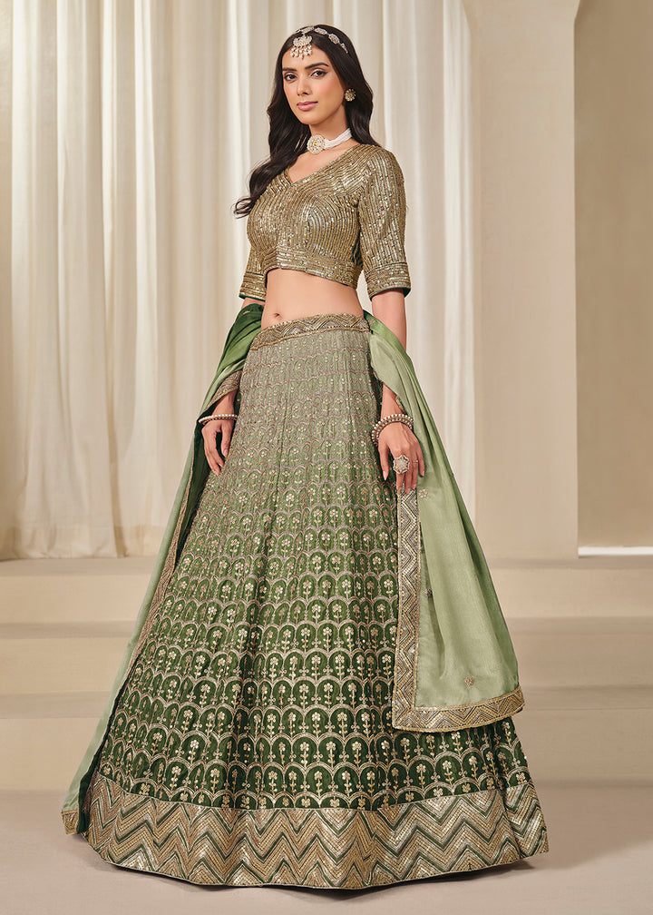 Buy Now Premium Green Chinnon Silk Wedding Festive Lehenga Choli Online in US, UK, Canada, France, Italy, Germany, Australia, UAE, Spain & Worldwide at Empress.