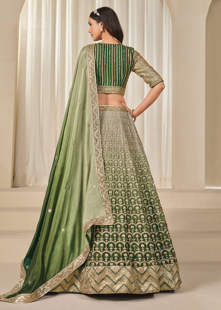 Buy Now Premium Green Chinnon Silk Wedding Festive Lehenga Choli Online in US, UK, Canada, France, Italy, Germany, Australia, UAE, Spain & Worldwide at Empress.