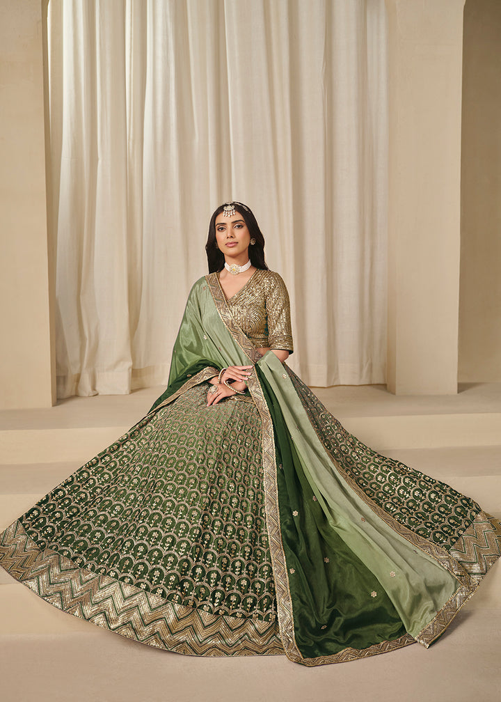 Buy Now Premium Green Chinnon Silk Wedding Festive Lehenga Choli Online in US, UK, Canada, France, Italy, Germany, Australia, UAE, Spain & Worldwide at Empress.