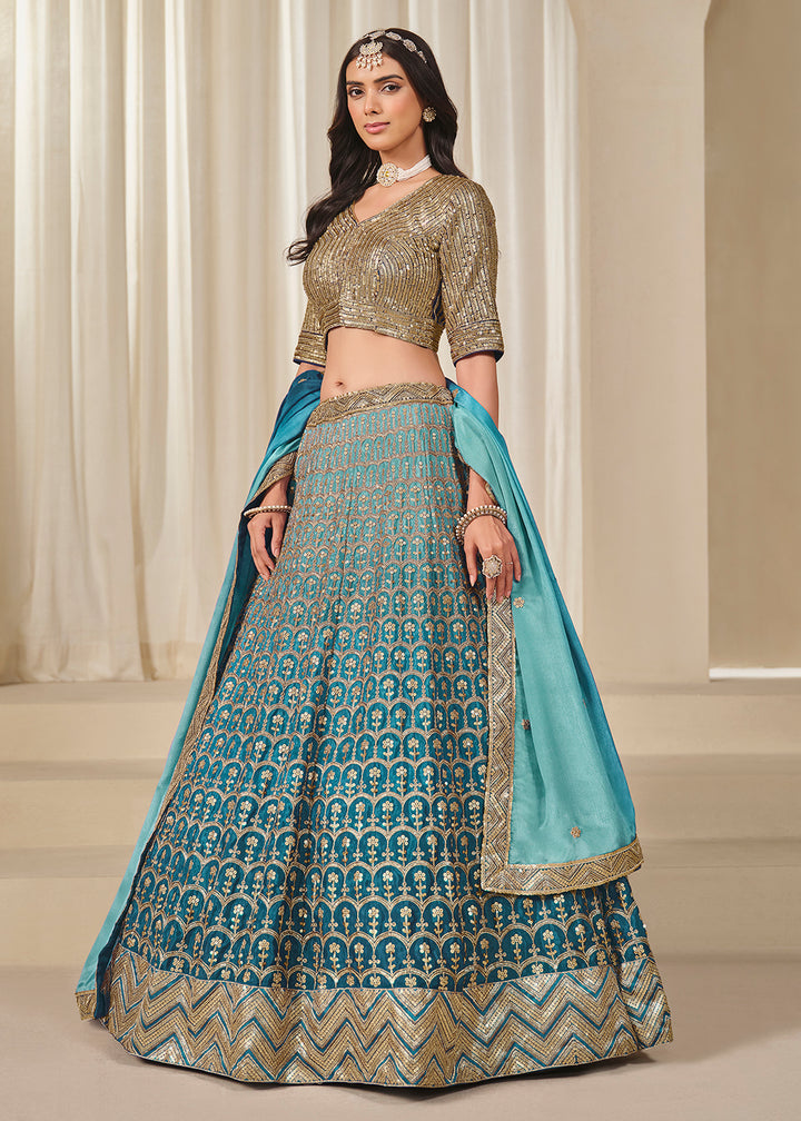 Buy Now Premium Teal Chinnon Silk Wedding Festive Lehenga Choli Online in US, UK, Canada, France, Italy, Germany, Australia, UAE, Spain & Worldwide at Empress.