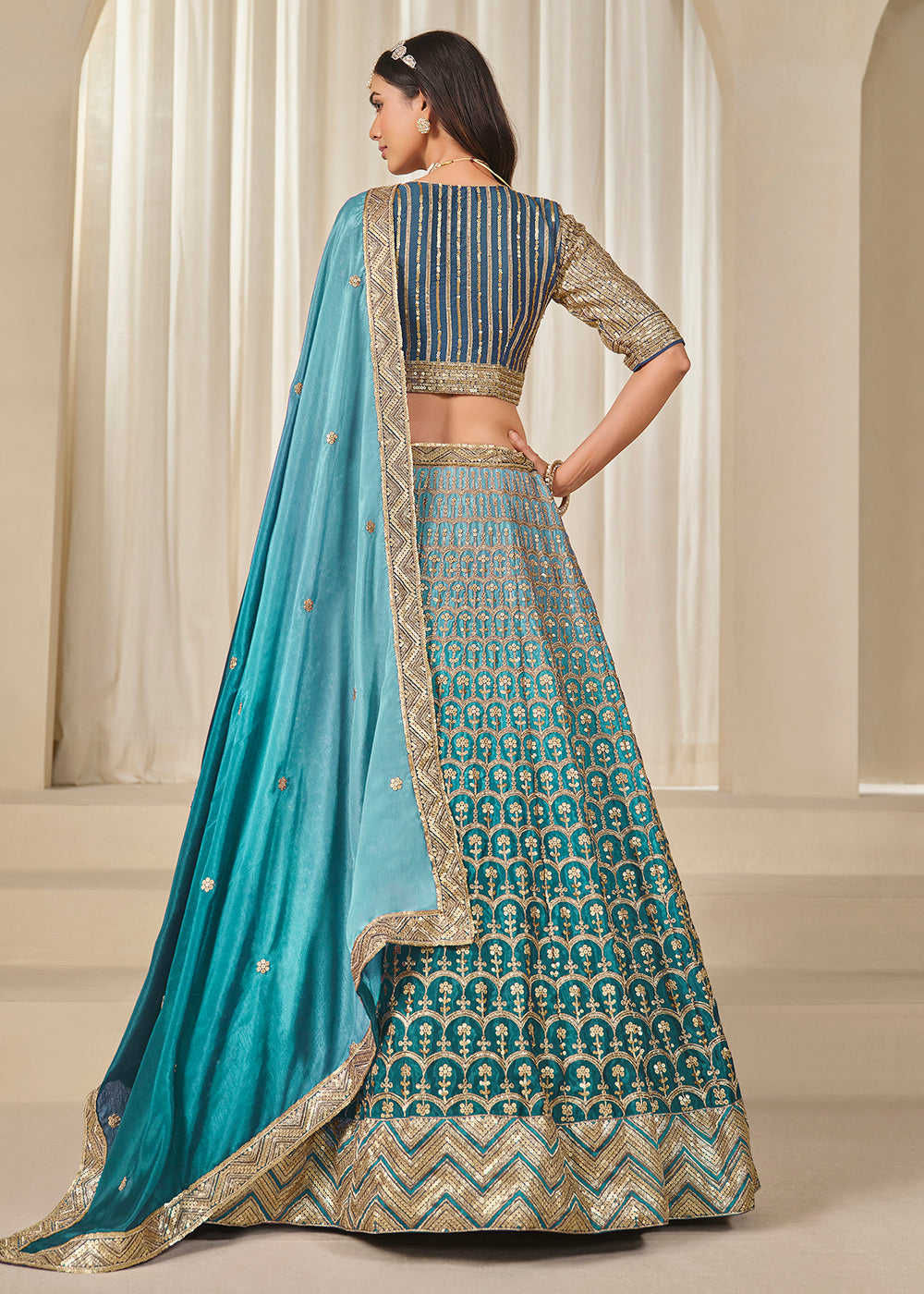 Buy Now Premium Teal Chinnon Silk Wedding Festive Lehenga Choli Online in US, UK, Canada, France, Italy, Germany, Australia, UAE, Spain & Worldwide at Empress.