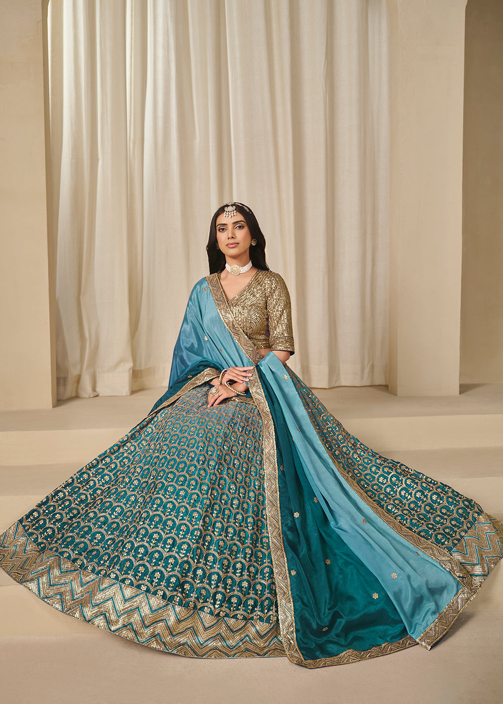 Buy Now Premium Teal Chinnon Silk Wedding Festive Lehenga Choli Online in US, UK, Canada, France, Italy, Germany, Australia, UAE, Spain & Worldwide at Empress.