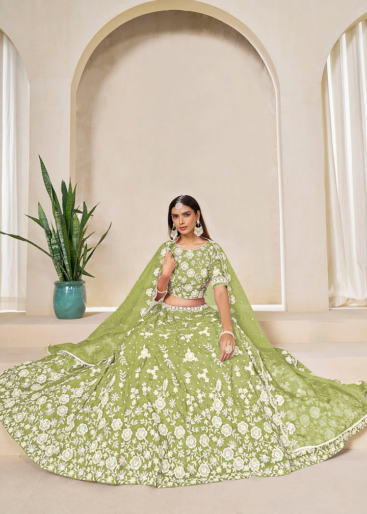 Buy Now Green Crush Fill Organza Festive Style Lehenga Choli Online in US, UK, Canada, France, Italy, Germany, Australia, UAE, Spain & Worldwide at Empress.