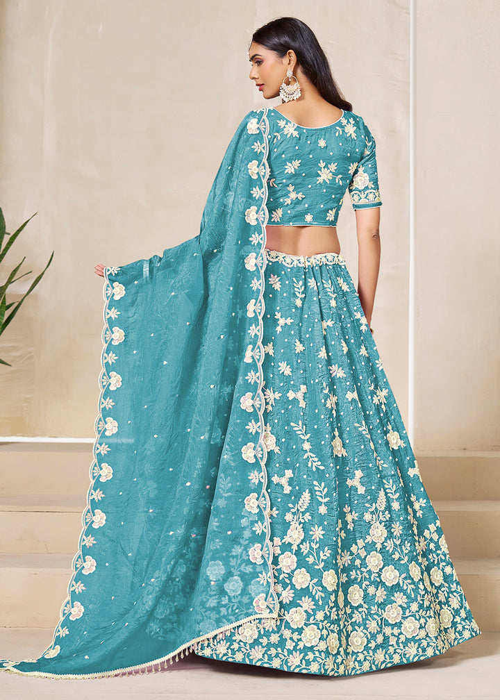 Buy Now Blue Crush Fill Organza Festive Style Lehenga Choli Online in US, UK, Canada, France, Italy, Germany, Australia, UAE, Spain & Worldwide at Empress.