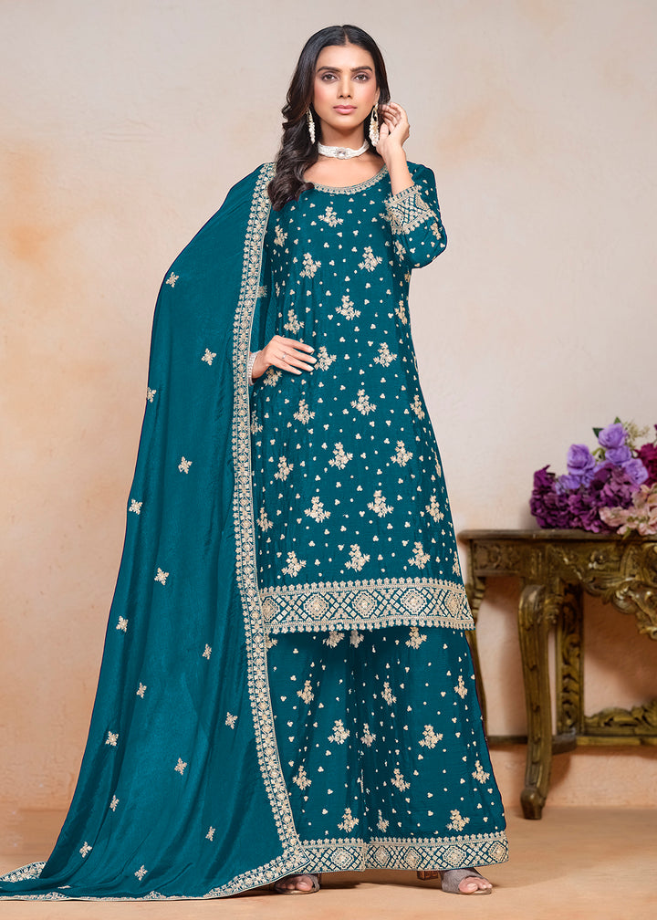 Buy Now Teal Blue Sequins Embroidered Chinnon Festive Palazzo Suit Online in USA, UK, Canada, Germany & Worldwide at Empress Clothing.