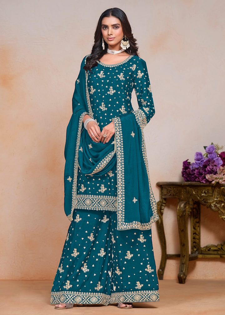 Buy Now Teal Blue Sequins Embroidered Chinnon Festive Palazzo Suit Online in USA, UK, Canada, Germany & Worldwide at Empress Clothing.