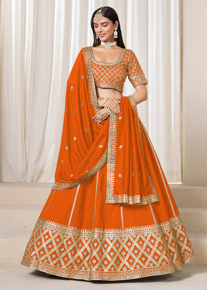 Buy Now Wedding Wear Chic Orange Art Silk Lehenga Choli Online in USA, UK, Canada, France, Italy, Germany, Austria, Qatar, UAE, Denmark & Worldwide at Empress.