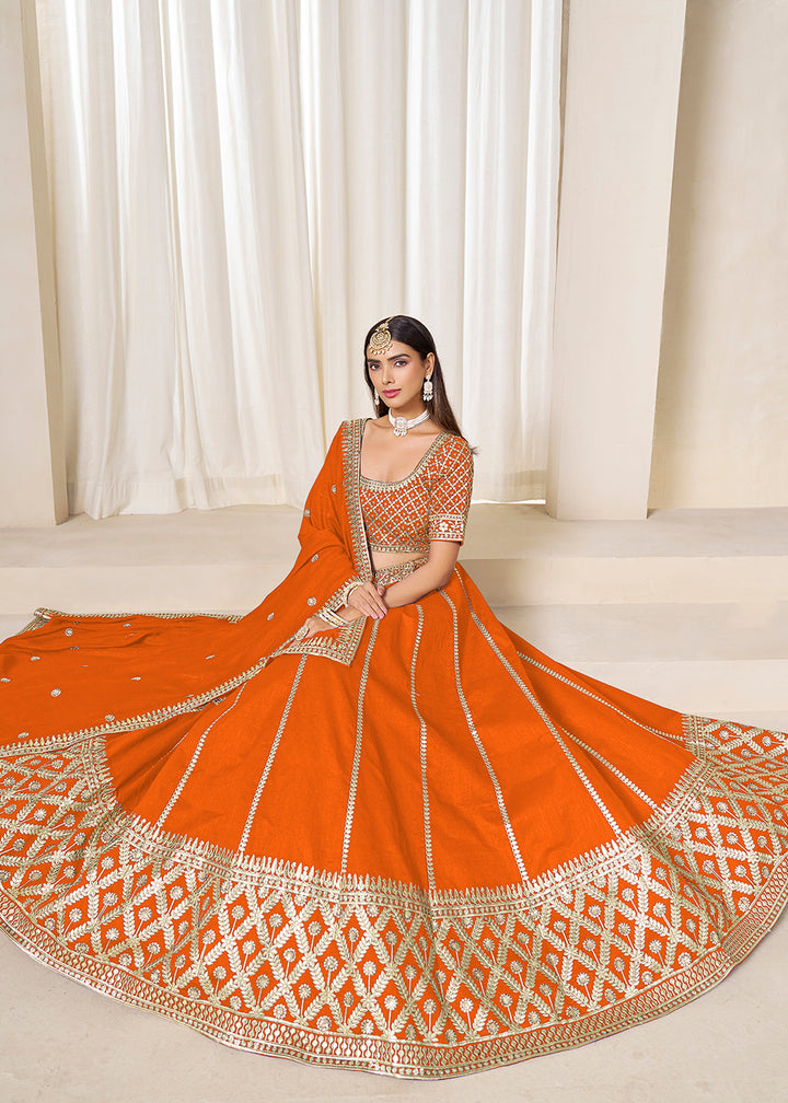 Buy Now Wedding Wear Chic Orange Art Silk Lehenga Choli Online in USA, UK, Canada, France, Italy, Germany, Austria, Qatar, UAE, Denmark & Worldwide at Empress.