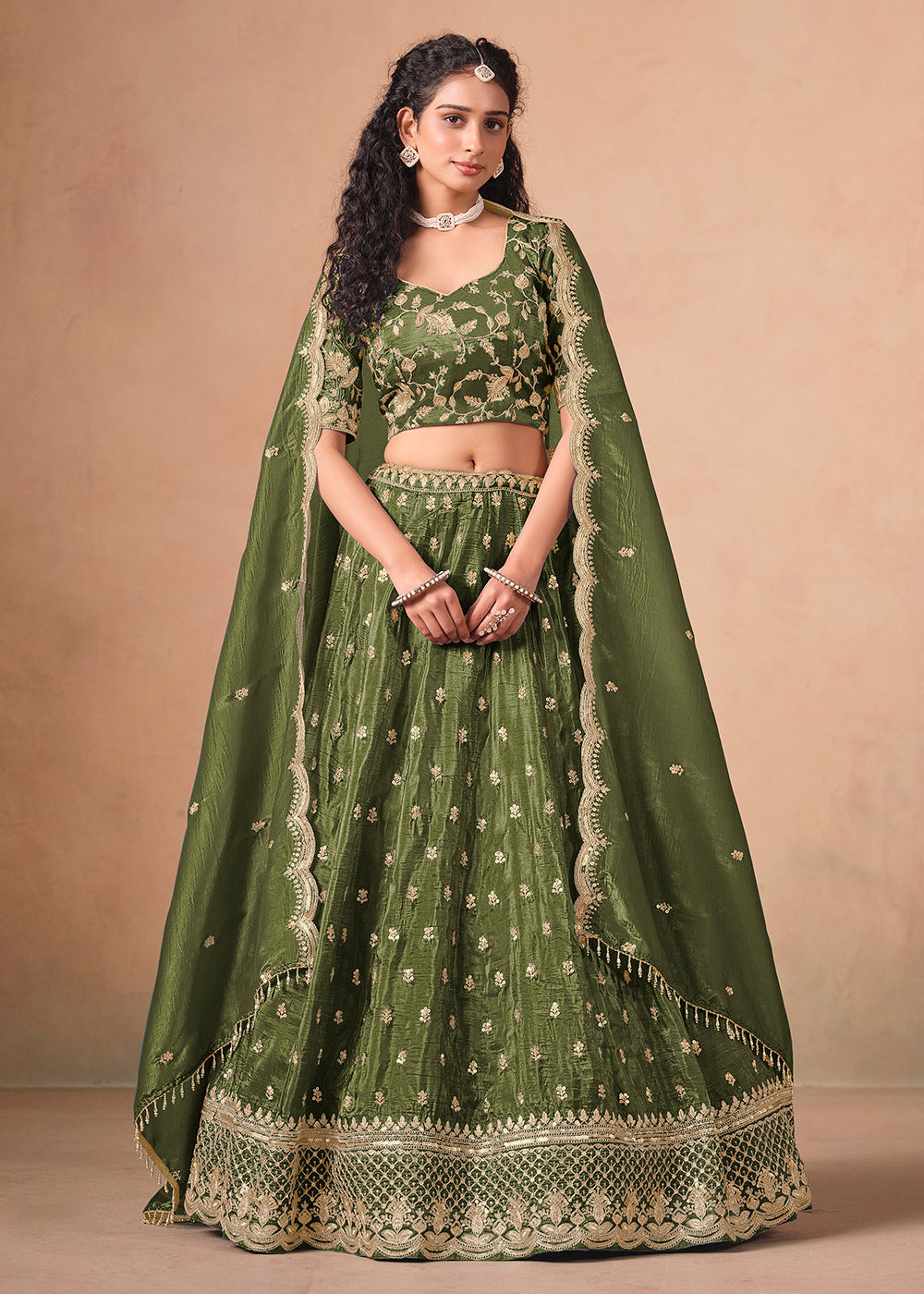 Buy Now Green Organza Crushed Embroidered Lehenga Choli Online in US, UK, Canada, France, Italy, Germany, Austria, Qatar, UAE, Denmark & Worldwide at Empress.