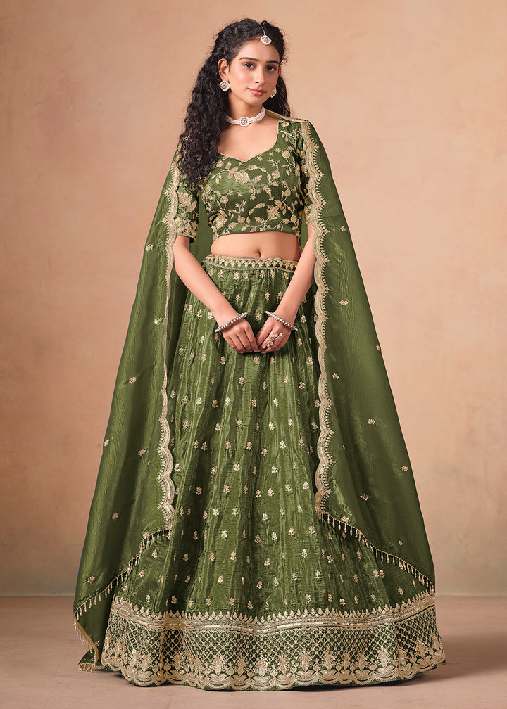 Buy Now Green Organza Crushed Embroidered Lehenga Choli Online in US, UK, Canada, France, Italy, Germany, Austria, Qatar, UAE, Denmark & Worldwide at Empress.