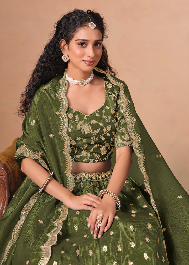 Buy Now Green Organza Crushed Embroidered Lehenga Choli Online in US, UK, Canada, France, Italy, Germany, Austria, Qatar, UAE, Denmark & Worldwide at Empress.