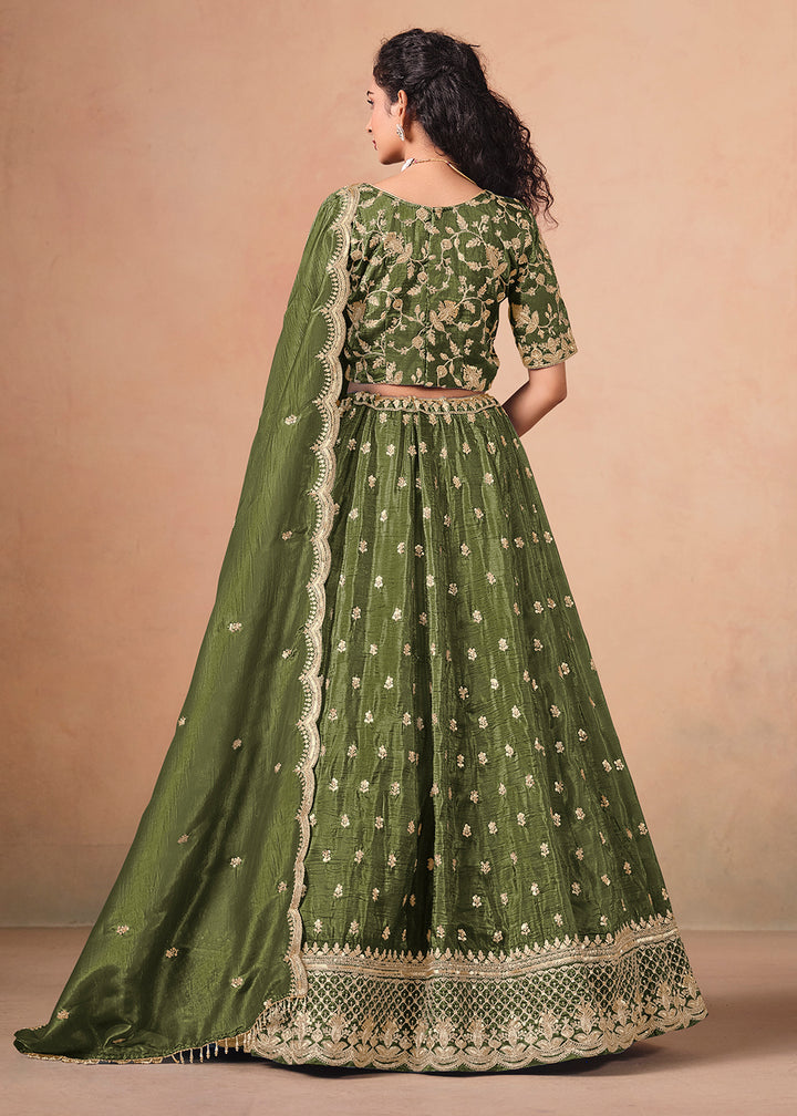 Buy Now Green Organza Crushed Embroidered Lehenga Choli Online in US, UK, Canada, France, Italy, Germany, Austria, Qatar, UAE, Denmark & Worldwide at Empress.
