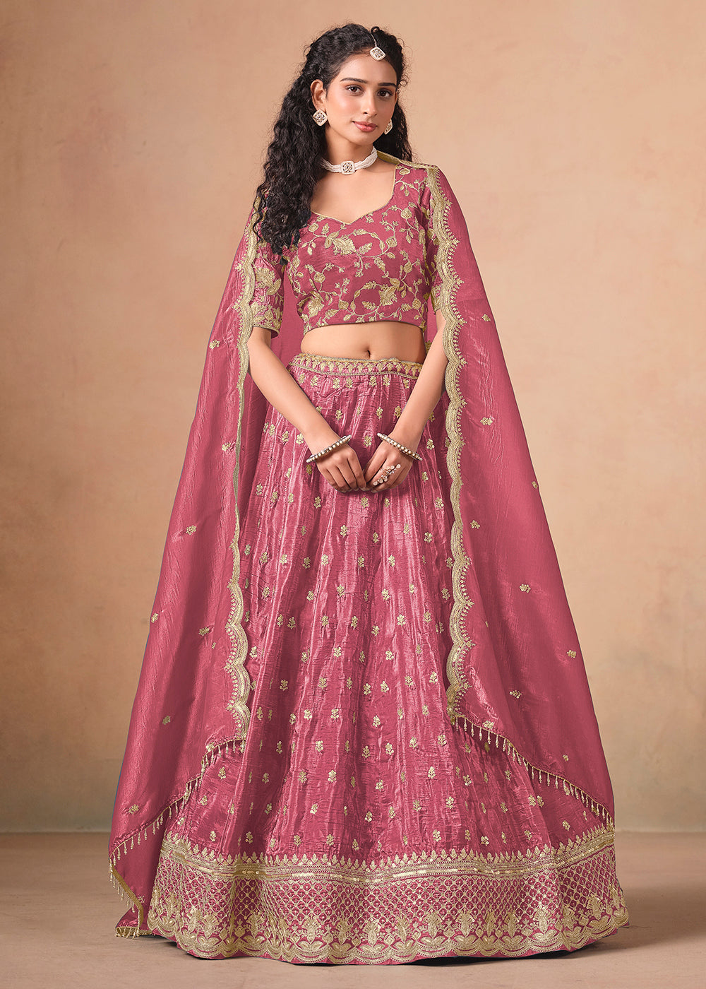 Buy Now Pink Organza Crushed Embroidered Lehenga Choli Online in US, UK, Canada, France, Italy, Germany, Austria, Qatar, UAE, Denmark & Worldwide at Empress.