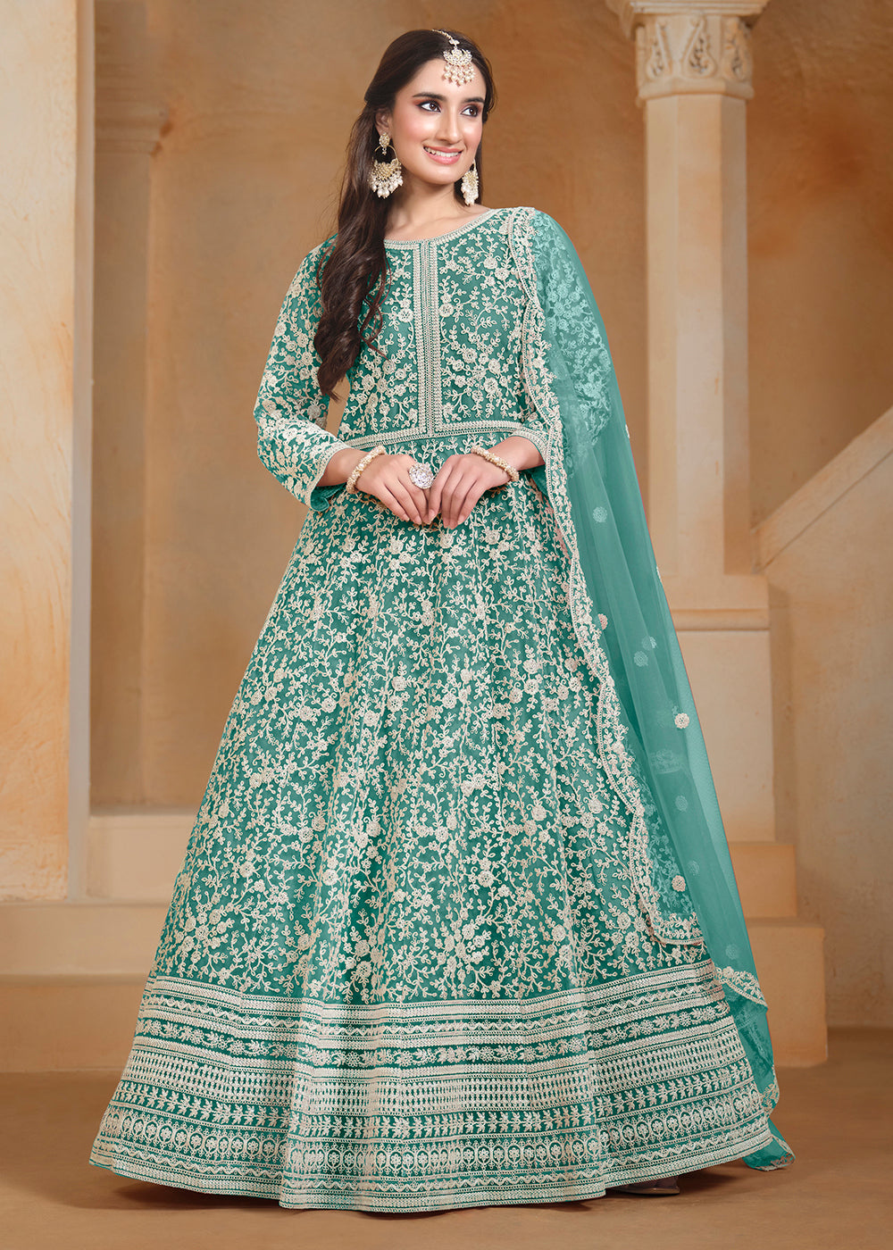 Buy Now Net Teal Green Embroidered Festive Style Anarkali Suit Online in USA, UK, Australia, Italy, Germany, Canada, UAE & Worldwide at Empress Clothing. 