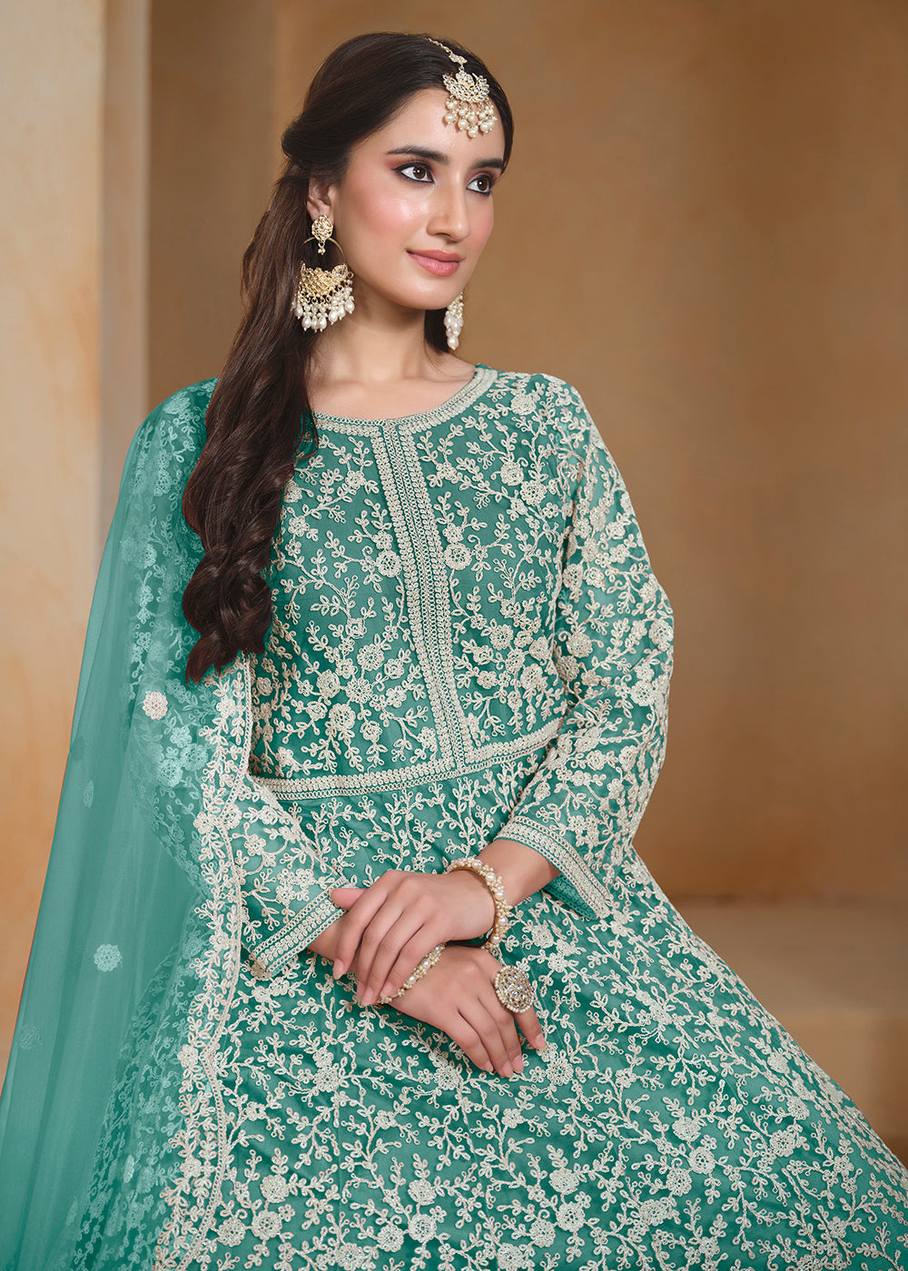 Buy Now Net Teal Green Embroidered Festive Style Anarkali Suit Online in USA, UK, Australia, Italy, Germany, Canada, UAE & Worldwide at Empress Clothing. 