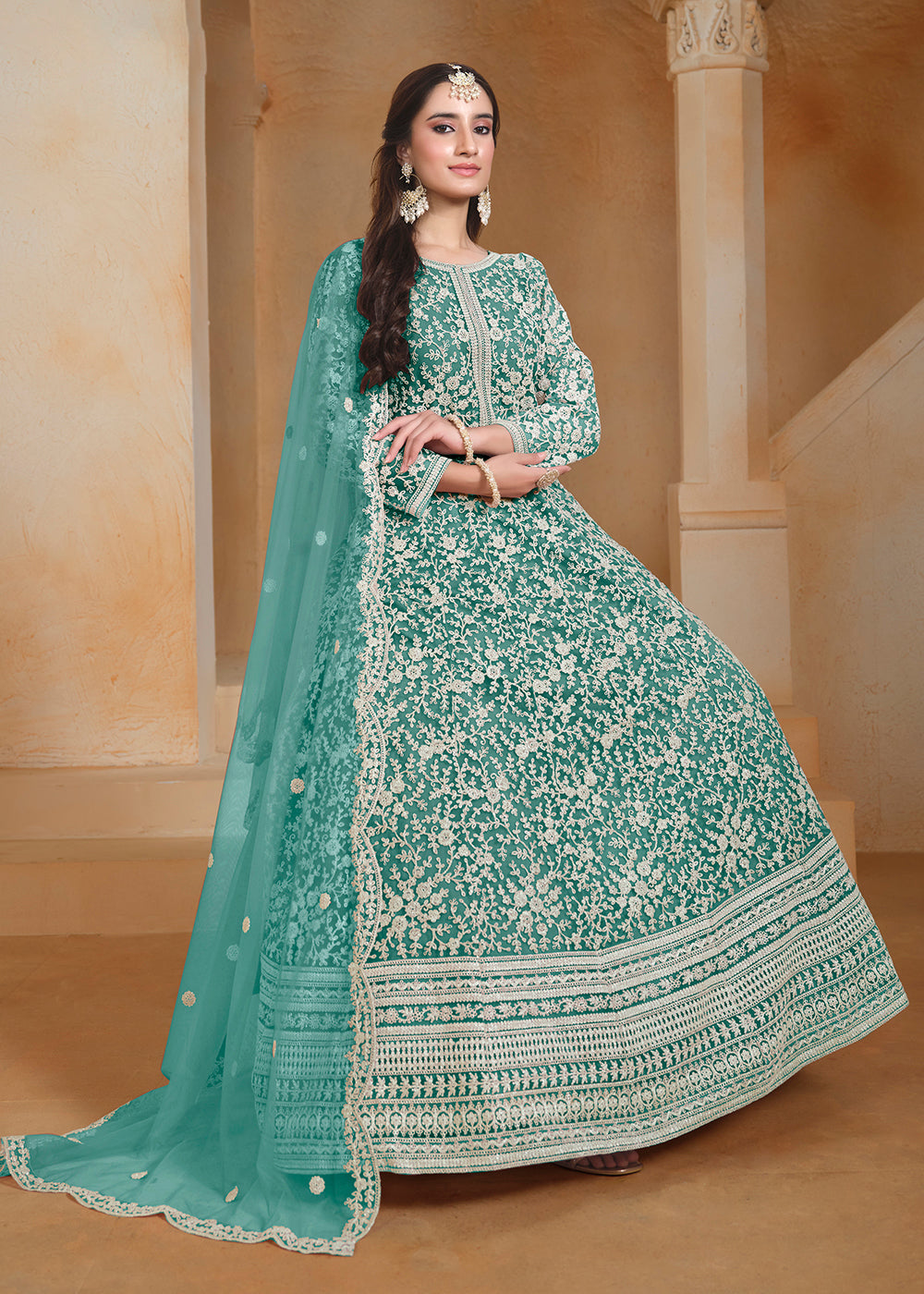 Buy Now Net Teal Green Embroidered Festive Style Anarkali Suit Online in USA, UK, Australia, Italy, Germany, Canada, UAE & Worldwide at Empress Clothing. 