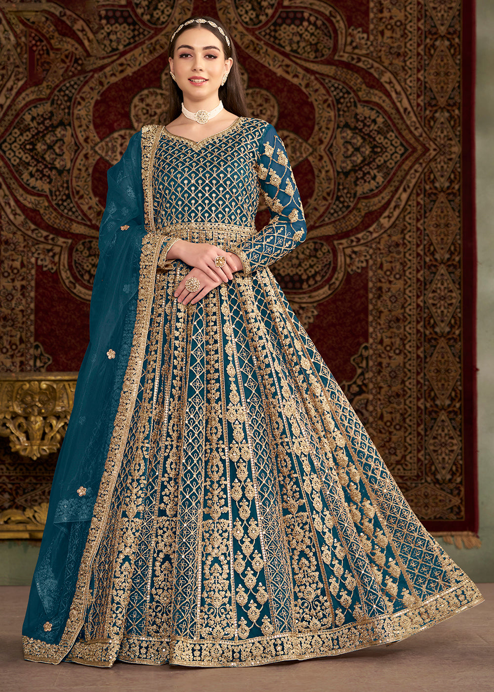 Buy Now Teal Blue All Over Embroidered Net Wedding Anarkali Gown Online in USA, UK, Australia, Italy, Germany, Canada, UAE & Worldwide at Empress Clothing.