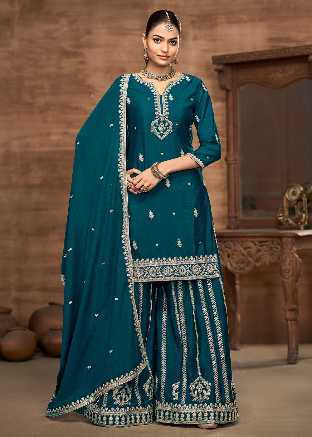 Buy Now Blue Chinnon Embroidered Festive Palazzo Suit Online in USA, UK, Canada, Germany, Italy, France, Austria, UAE & Worldwide at Empress Clothing.