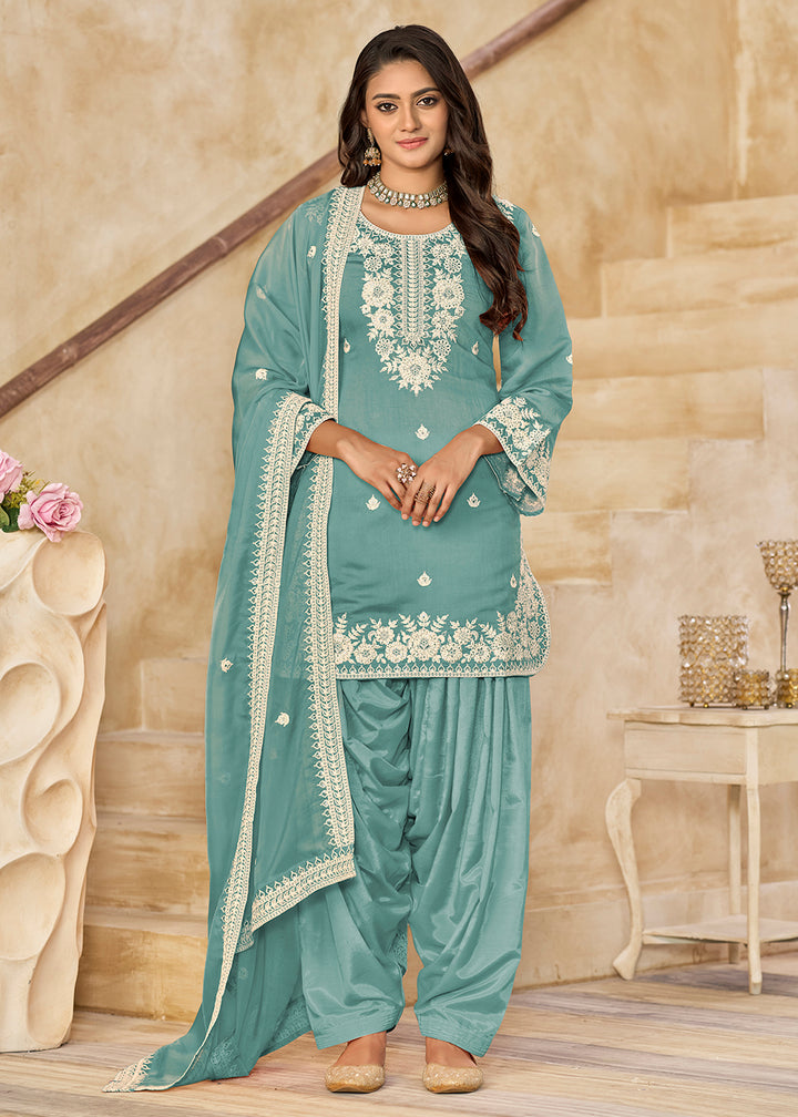 Buy Now Blue Roman Silk Embroidered Punjabi Patiala Suit Online in USA, UK, Canada, Germany, Italy, France, Denmark, UAE & Worldwide at Empress Clothing.