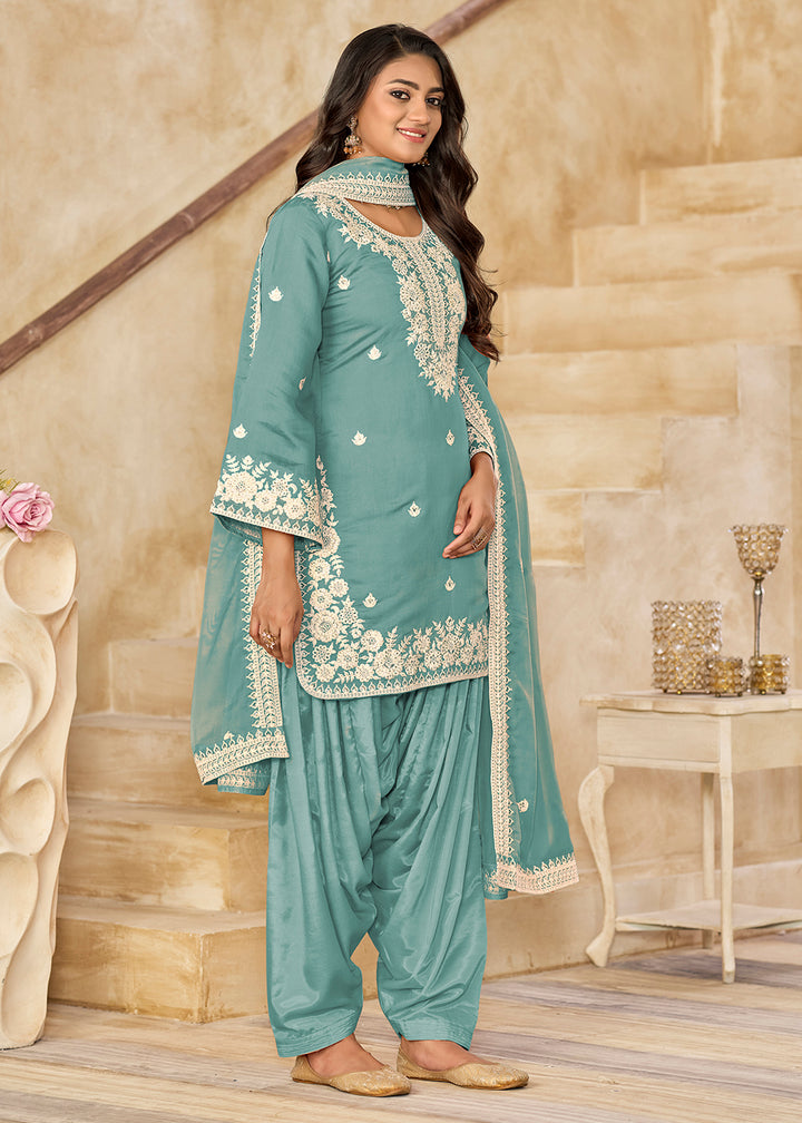 Buy Now Blue Roman Silk Embroidered Punjabi Patiala Suit Online in USA, UK, Canada, Germany, Italy, France, Denmark, UAE & Worldwide at Empress Clothing.