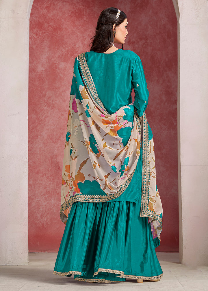 Shop Now Turquoise Zari Threads Work Festive Gharara Style Suit Online in USA, UK, Canada, France, Qatar, Germany, Italy, Spain & Worldwide at Empress Clothing.