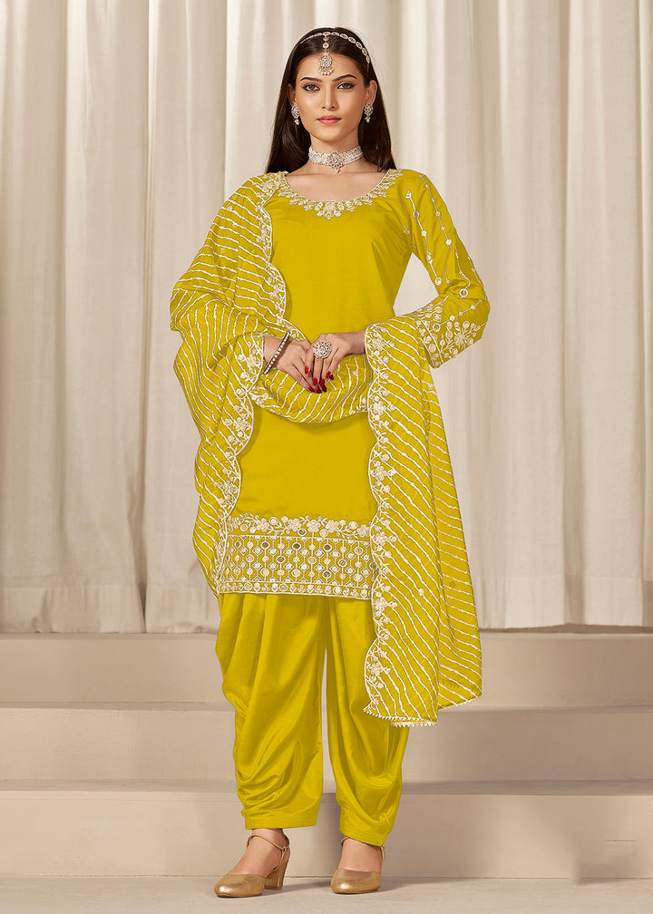 Buy Now Yellow Silk Embroidered Patiala Punjabi Suit Online in USA, UK, Canada, Germany, Italy, France, Denmark, Austria, UAE & Worldwide at Empress Clothing.