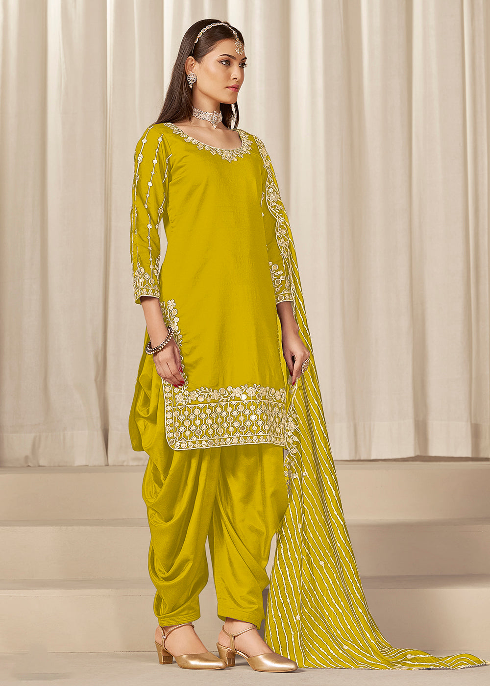 Buy Now Yellow Silk Embroidered Patiala Punjabi Suit Online in USA, UK, Canada, Germany, Italy, France, Denmark, Austria, UAE & Worldwide at Empress Clothing.