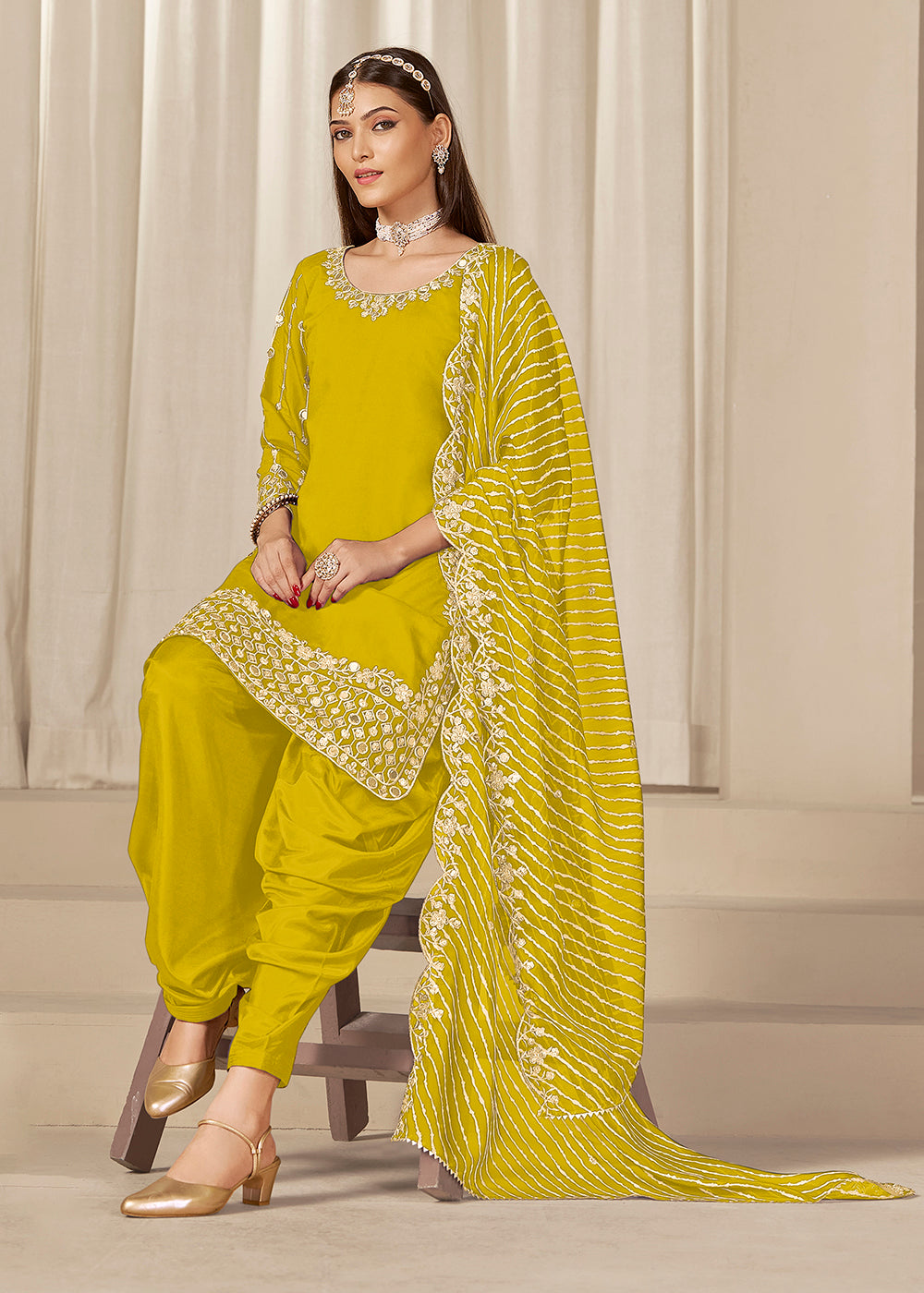 Buy Now Yellow Silk Embroidered Patiala Punjabi Suit Online in USA, UK, Canada, Germany, Italy, France, Denmark, Austria, UAE & Worldwide at Empress Clothing.