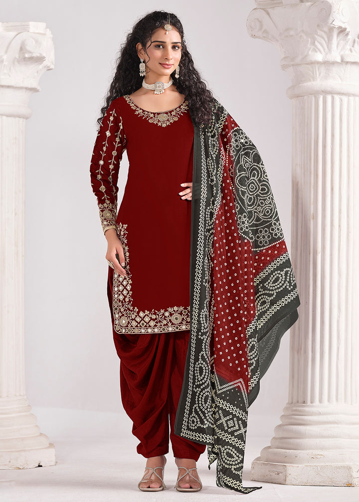 Buy Now Maroon Chanderi Silk Punjabi Patiala Style Suit Online in US, UK, Canada, Germany, Italy, France, Denmark, Austria, UAE & Worldwide at Empress Clothing.