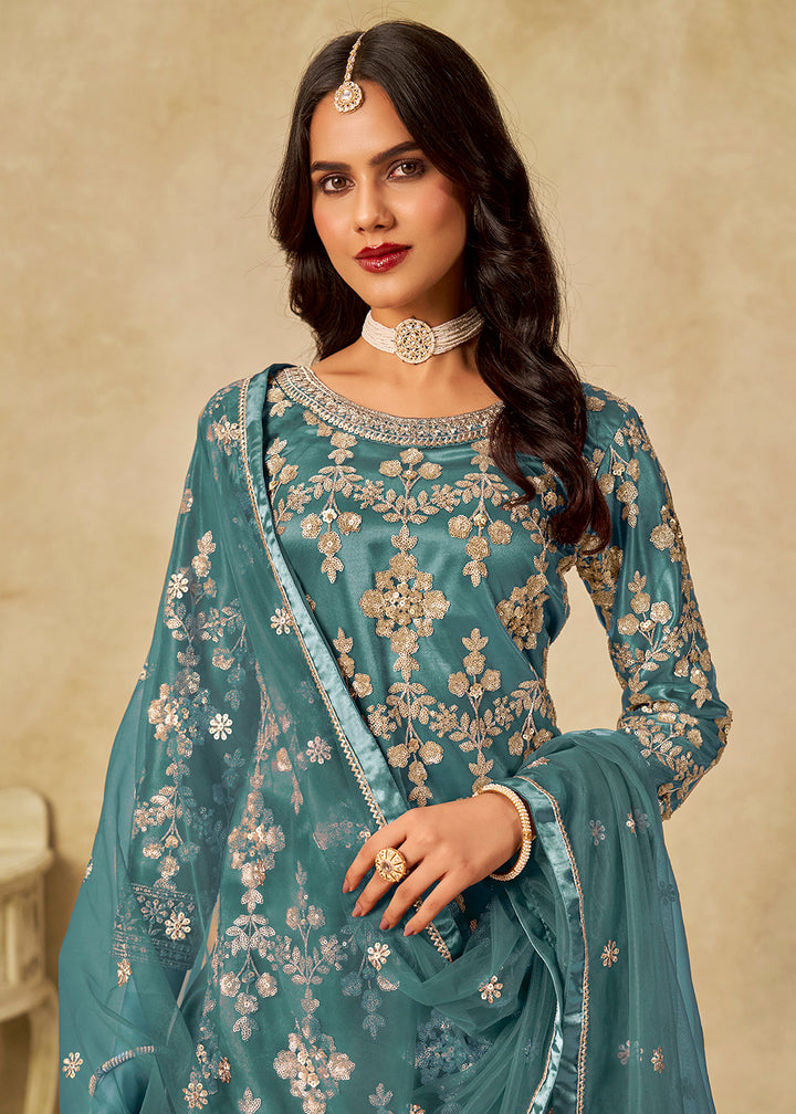 Buy Now Teal Beautifully Embroidered Net Wedding Palazzo Suit Online in Newark, Yorktown, Toronto, London, Orlando, Munich, Chicago & Worldwide at Empress.