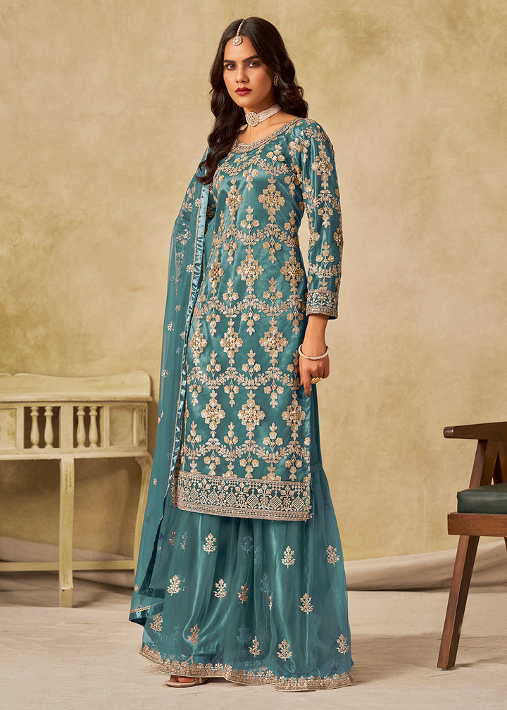 Buy Now Teal Beautifully Embroidered Net Wedding Palazzo Suit Online in Newark, Yorktown, Toronto, London, Orlando, Munich, Chicago & Worldwide at Empress.
