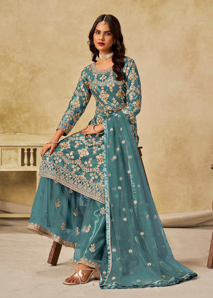 Buy Now Teal Beautifully Embroidered Net Wedding Palazzo Suit Online in Newark, Yorktown, Toronto, London, Orlando, Munich, Chicago & Worldwide at Empress.