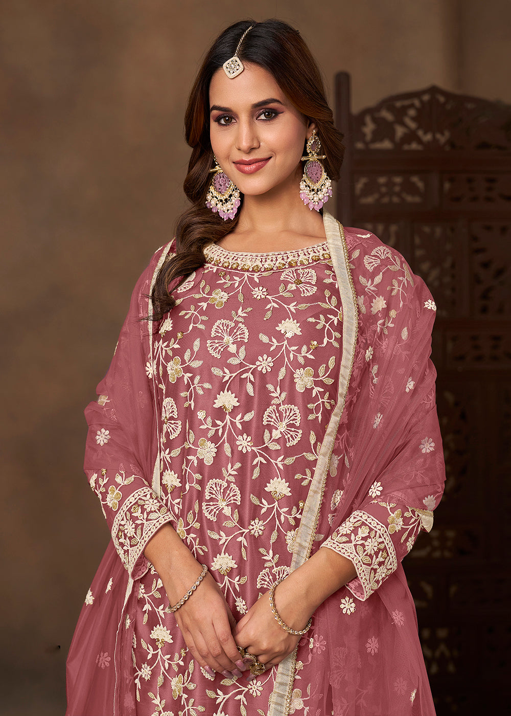 Shop Now Net Pink Wedding Embroidered Gharara Style Suit Online at Empress in USA, UK, Canada, Germany, Australia, Sweden, Denmark, UAE, Qatar & Worldwide.
