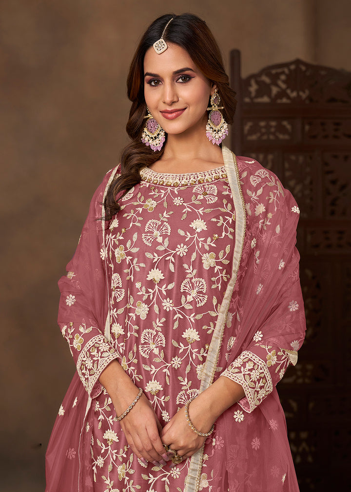 Shop Now Net Pink Wedding Embroidered Gharara Style Suit Online at Empress in USA, UK, Canada, Germany, Australia, Sweden, Denmark, UAE, Qatar & Worldwide.