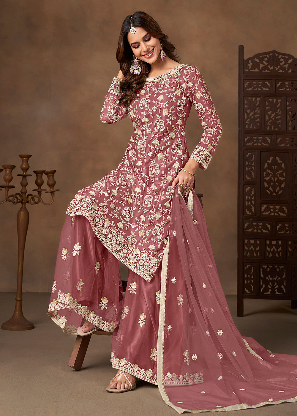 Shop Now Net Pink Wedding Embroidered Gharara Style Suit Online at Empress in USA, UK, Canada, Germany, Australia, Sweden, Denmark, UAE, Qatar & Worldwide.
