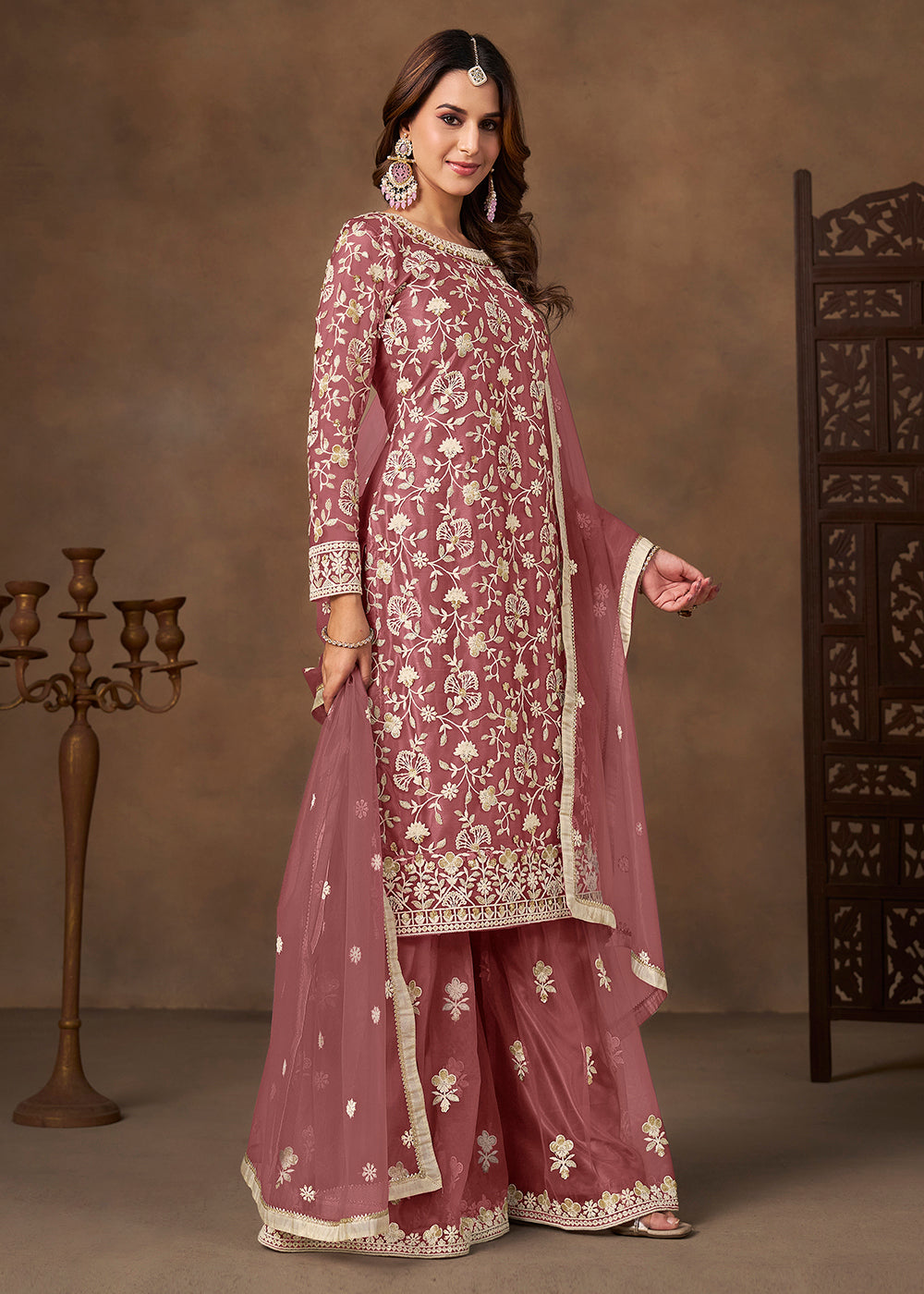 Shop Now Net Pink Wedding Embroidered Gharara Style Suit Online at Empress in USA, UK, Canada, Germany, Australia, Sweden, Denmark, UAE, Qatar & Worldwide.