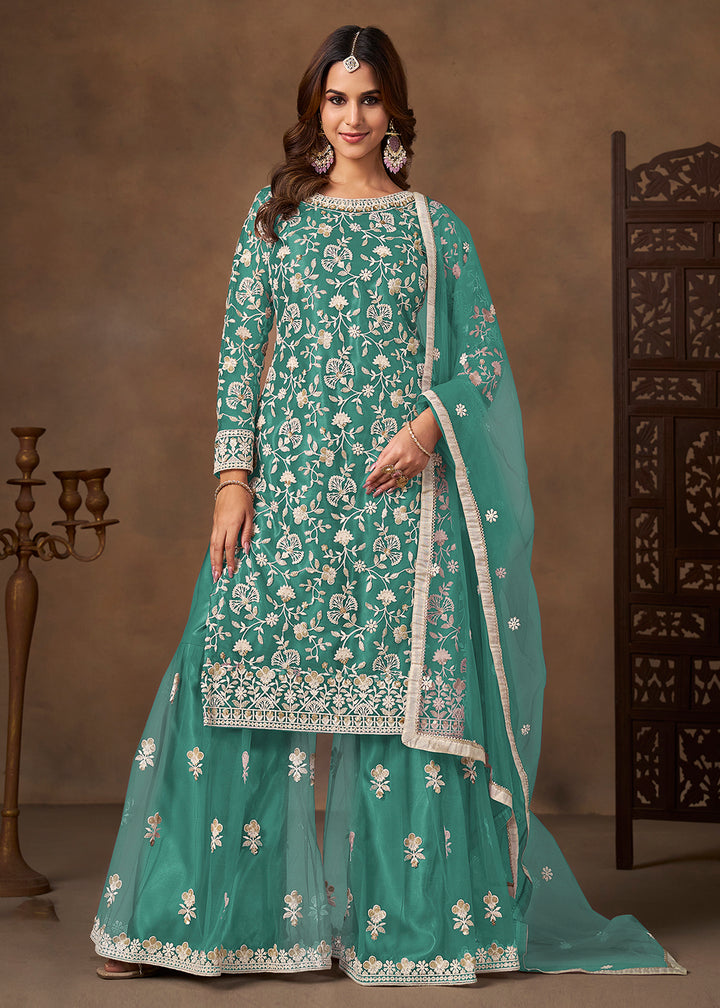 Shop Now Net Green Wedding Embroidered Gharara Style Suit Online at Empress in USA, UK, Canada, Germany, Australia, Sweden, Denmark, UAE, Qatar & Worldwide.